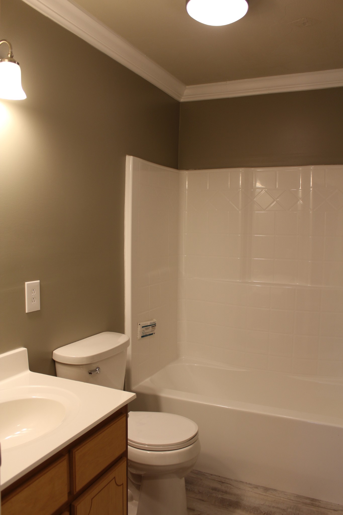 70 Pond Drive Tennessee Ridge, TN 37178 - Photo 16 of 28 a bathroom with a sink a toilet and shower