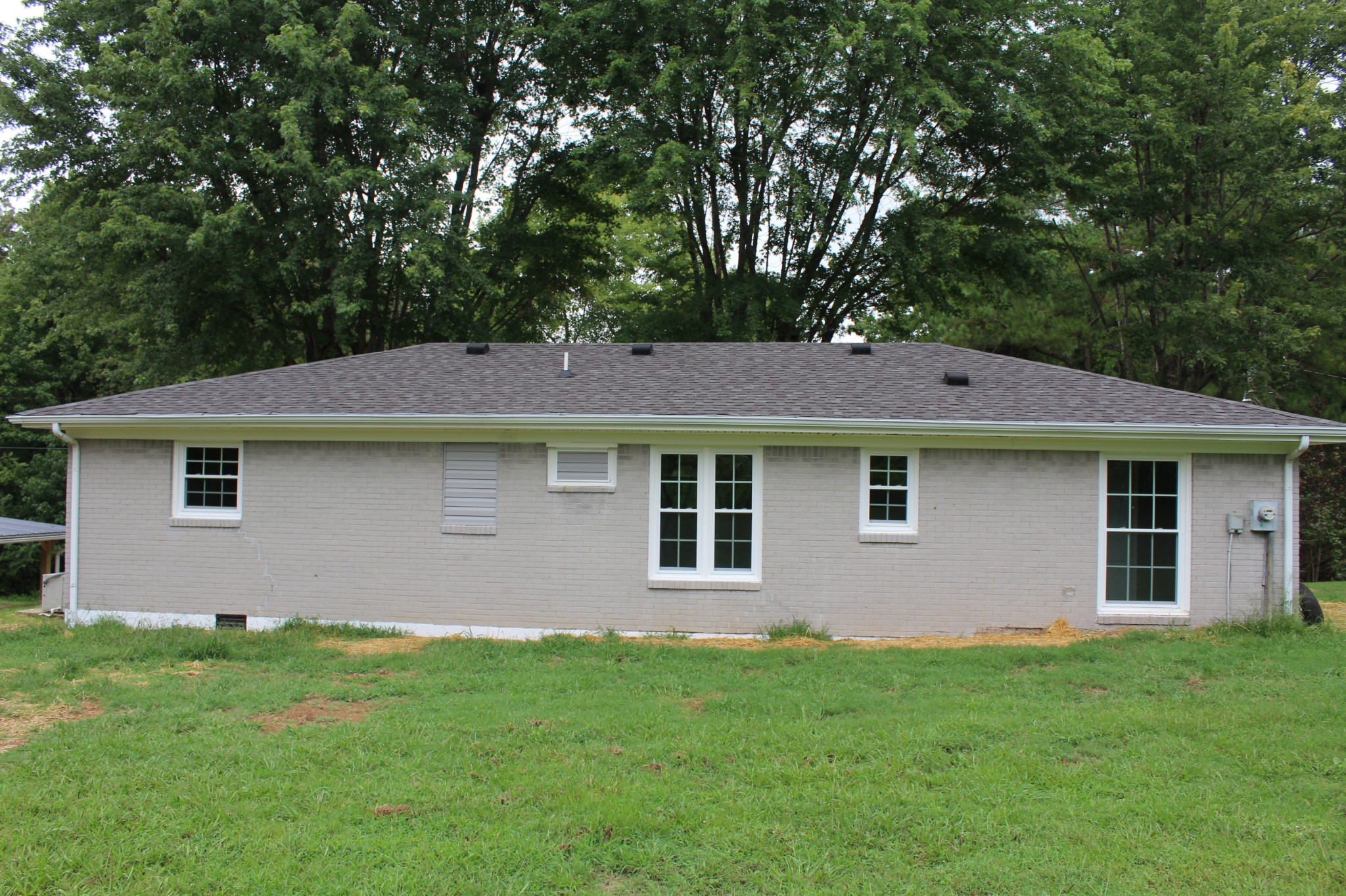 70 Pond Drive Tennessee Ridge, TN 37178 - Photo 26 of 28 a front view of a house with a yard