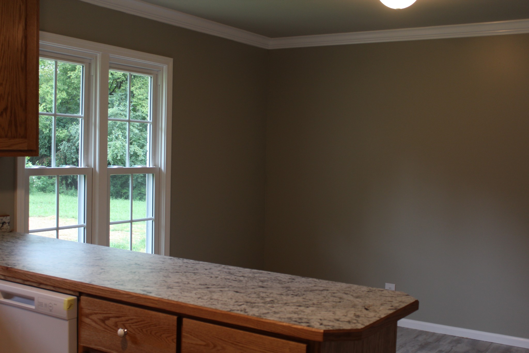 70 Pond Drive Tennessee Ridge, TN 37178 - Photo 4 of 28 a view of wooden floor and a window in an empty room
