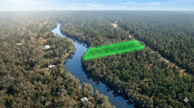 a view of a yard with an outdoor space