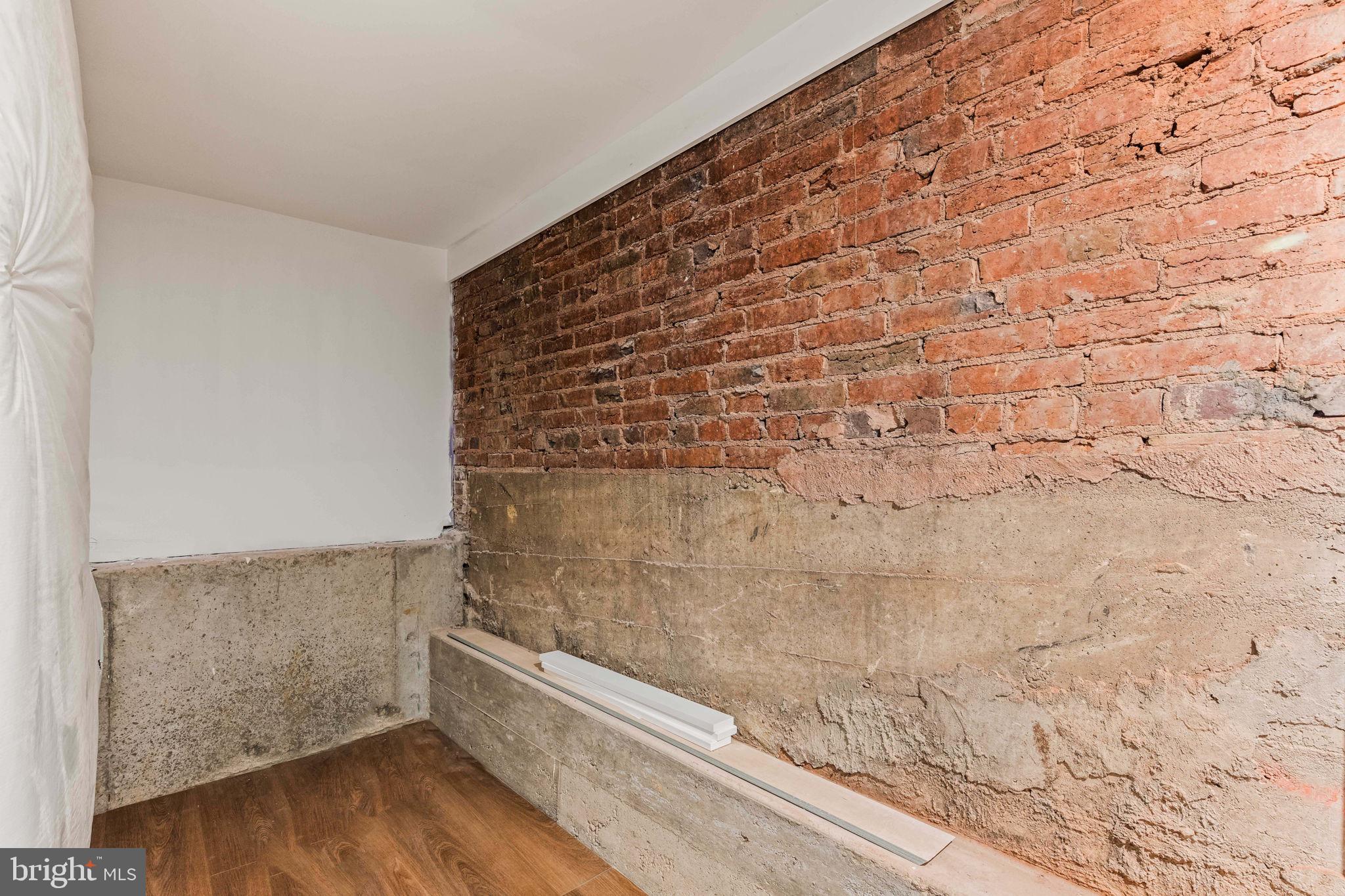 414 Rucker Place Alexandria, VA 22301 - Photo 113 of 135 a bathroom with a wooden floor and a shower