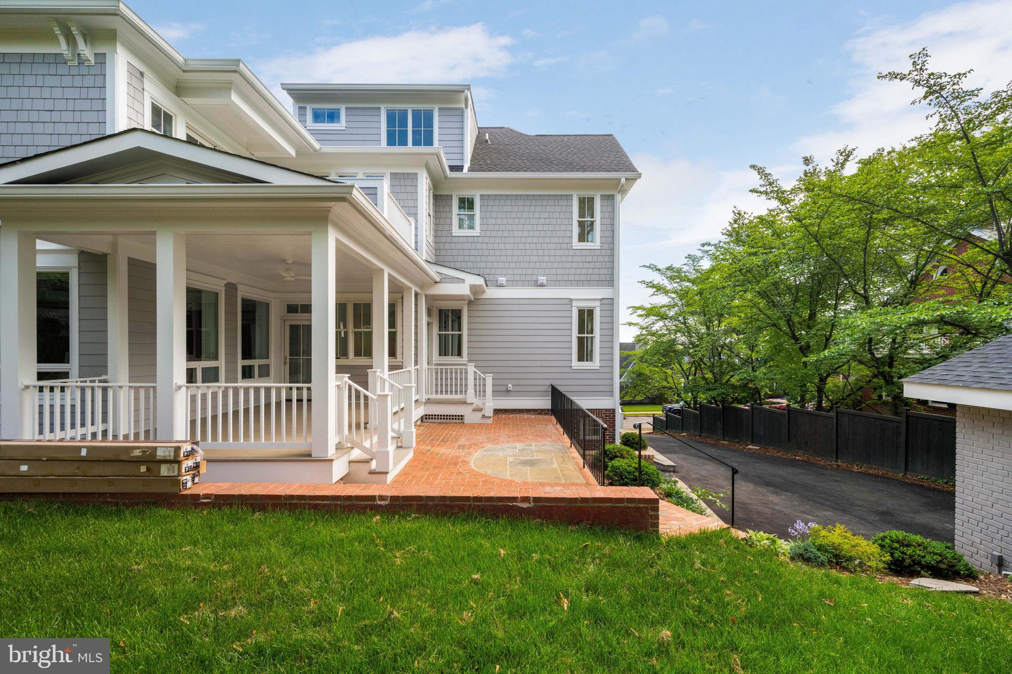 414 Rucker Place Alexandria, VA 22301 - Photo 128 of 135 a view of a house with a yard and sitting area