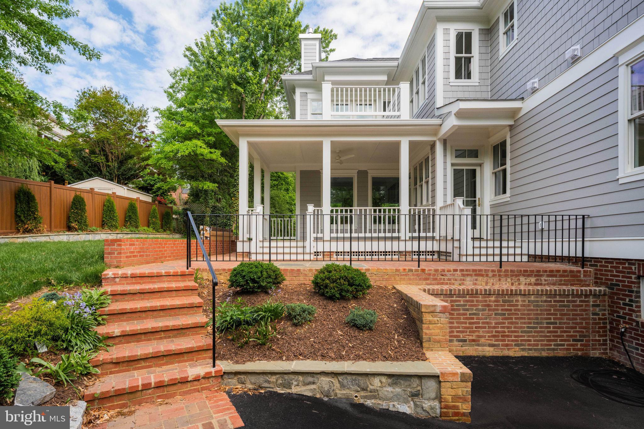 414 Rucker Place Alexandria, VA 22301 - Photo 129 of 135 a front view of a house with a yard