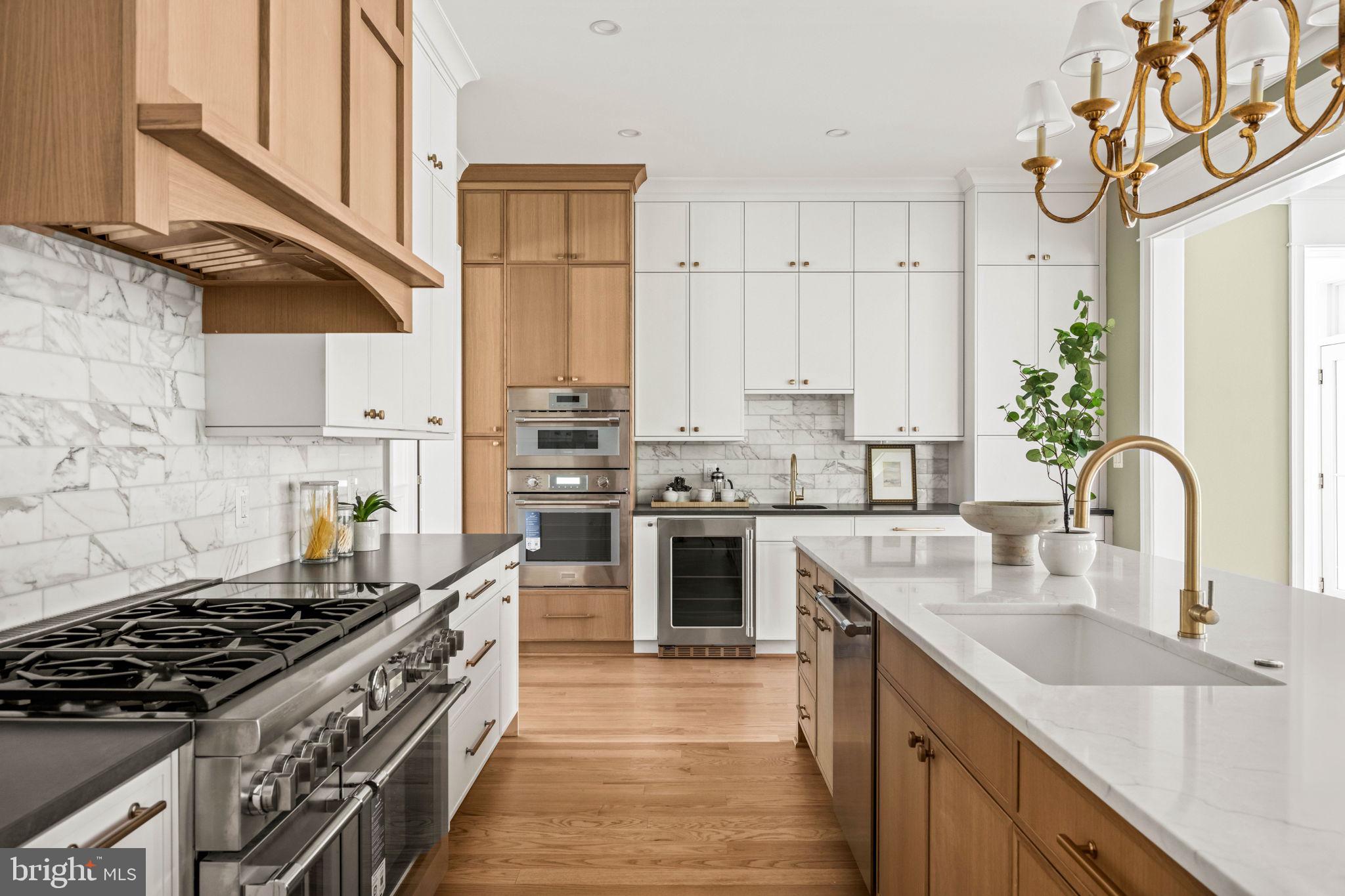 414 Rucker Place Alexandria, VA 22301 - Photo 36 of 135 a kitchen with stainless steel appliances granite countertop a stove a sink dishwasher and a refrigerator