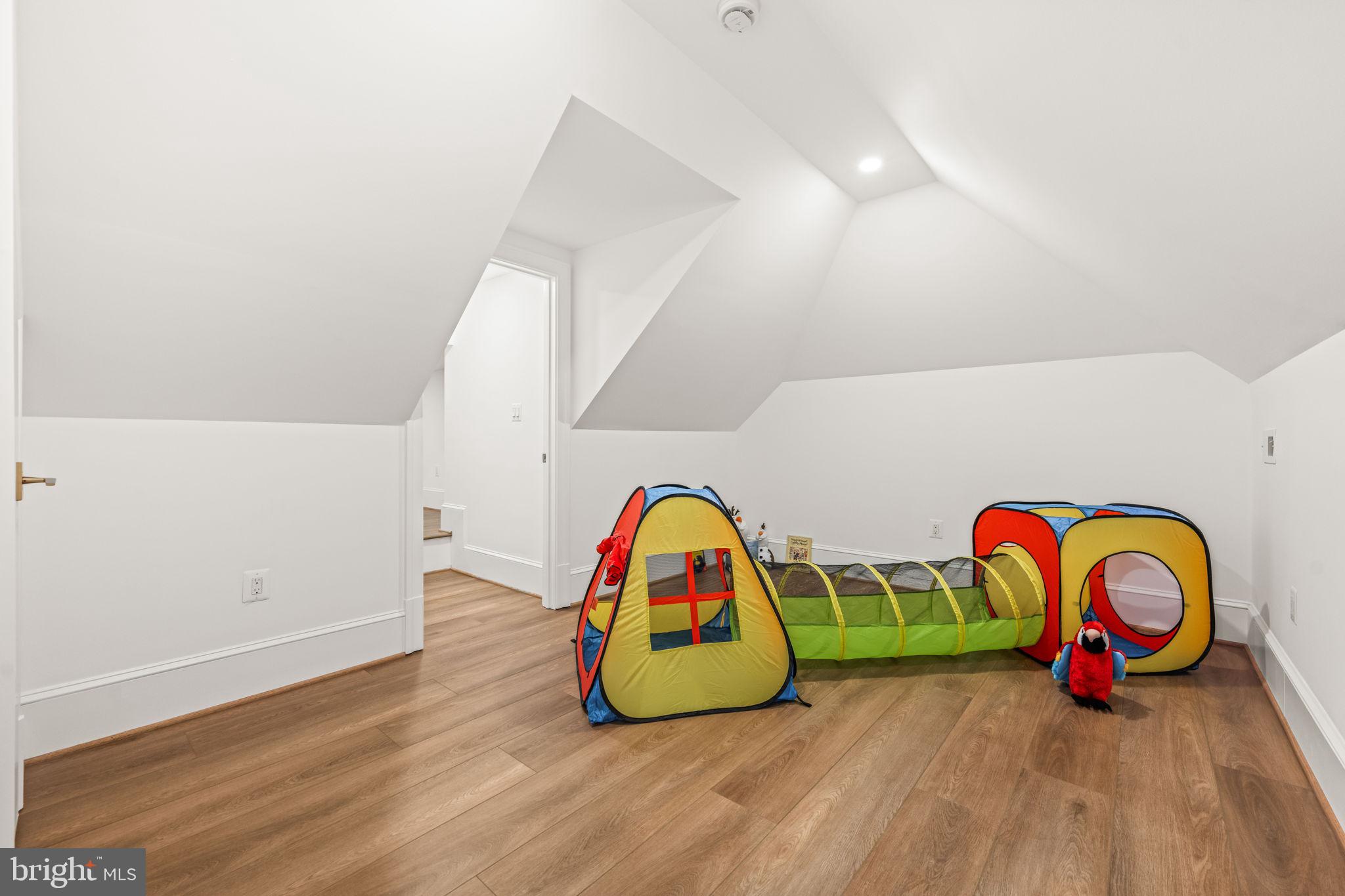 414 Rucker Place Alexandria, VA 22301 - Photo 94 of 135 a view of play room with toys and wooden floor