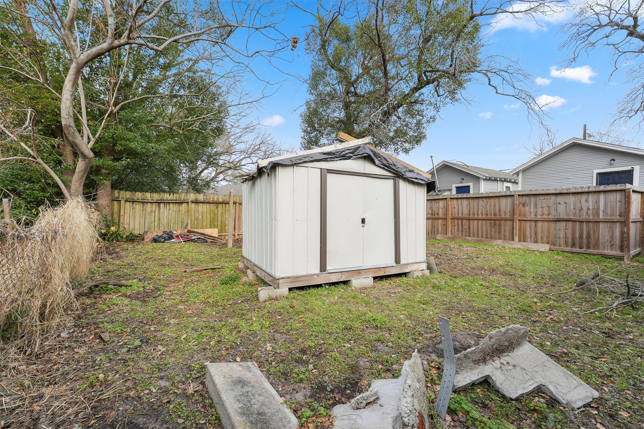 3706 Delano Street Houston, TX 77004 - Photo 11 of 21 a view of backyard with garden and deck