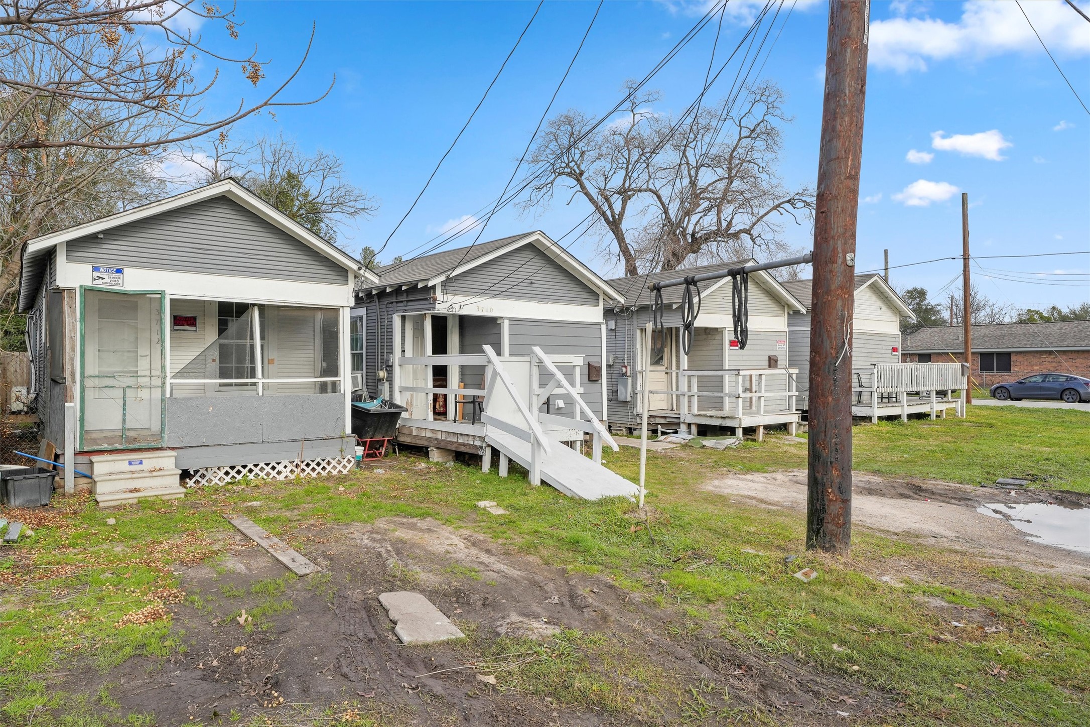 3706 Delano Street Houston, TX 77004 - Photo 15 of 21 a front view of a house with a yard table and chairs
