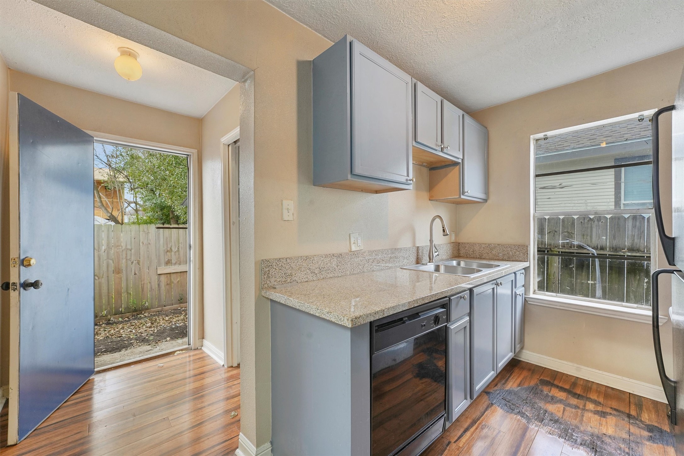 3706 Delano Street Houston, TX 77004 - Photo 8 of 21 a kitchen with a sink stove and cabinets