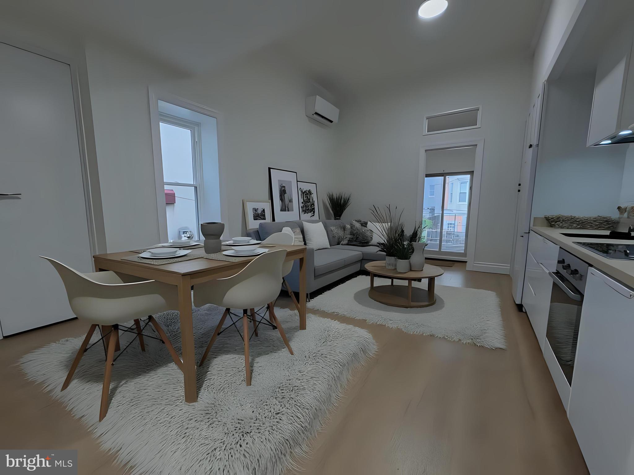 2007 Green Street, Unit 2R Philadelphia, PA 19130 - Photo 2 of 15 a view of a dining room with furniture