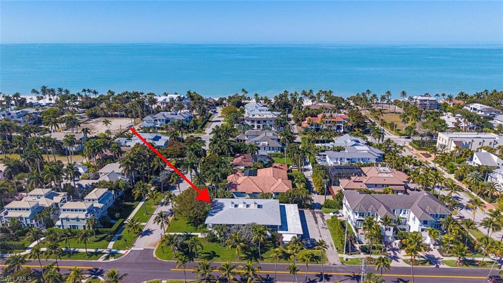 536 2nd Street South, Unit 536 Naples, FL 34102 - Photo 13 of 14 Aerial view of property's location featuring a large body of water and nearby suburban area