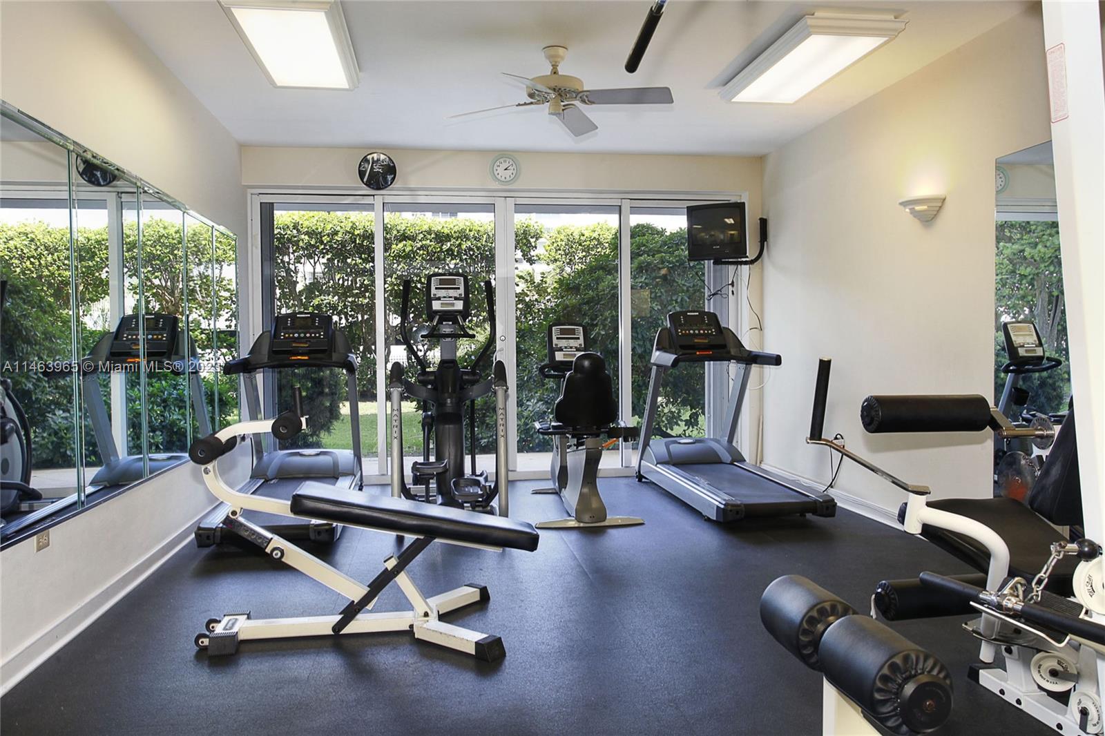 200 Ocean Ln Drive, Unit 703 Key Biscayne, FL 33149 - Photo 13 of 26 a view of a room with gym equipment