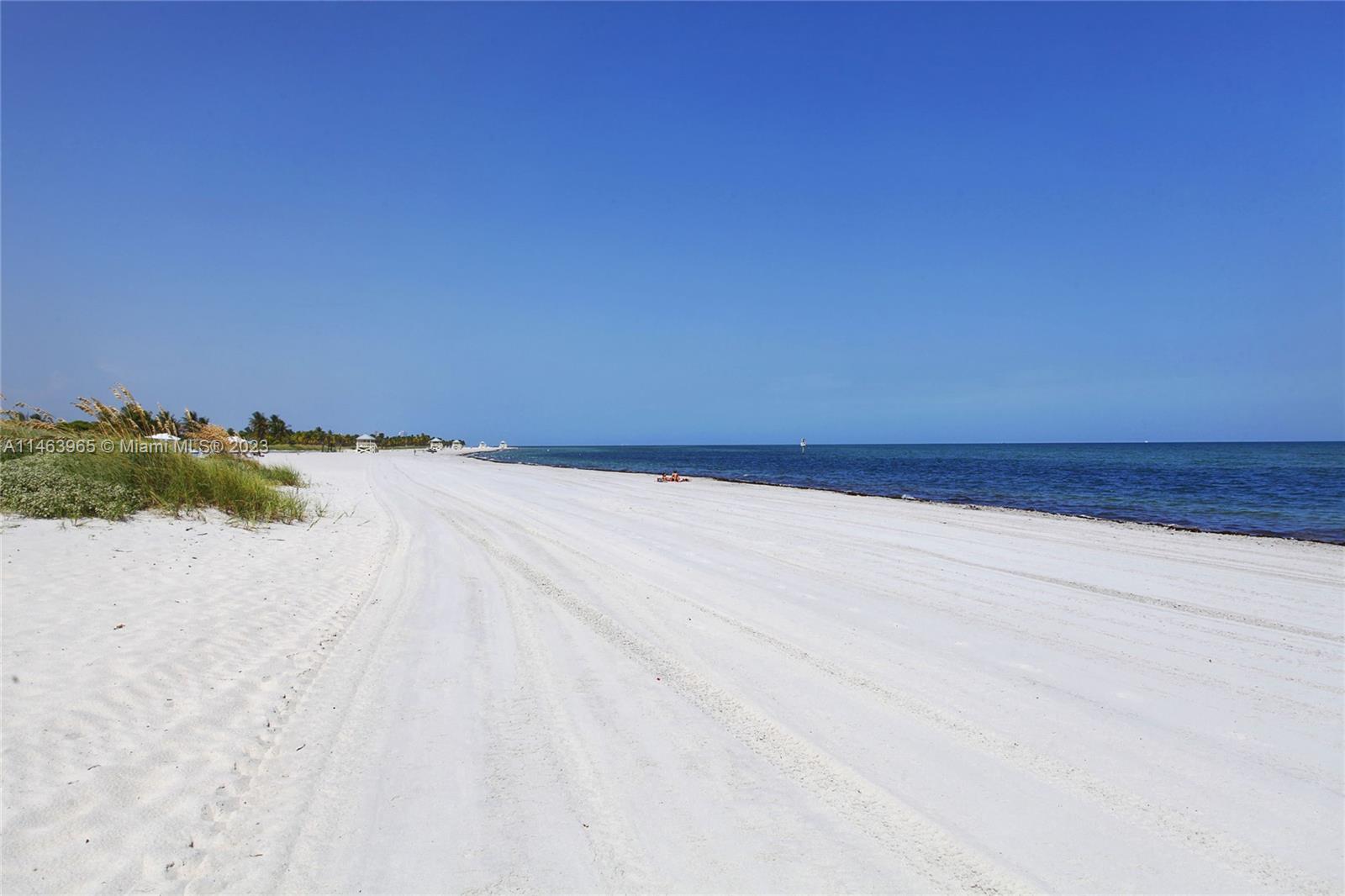 200 Ocean Ln Drive, Unit 703 Key Biscayne, FL 33149 - Photo 19 of 26 a view of an ocean beach