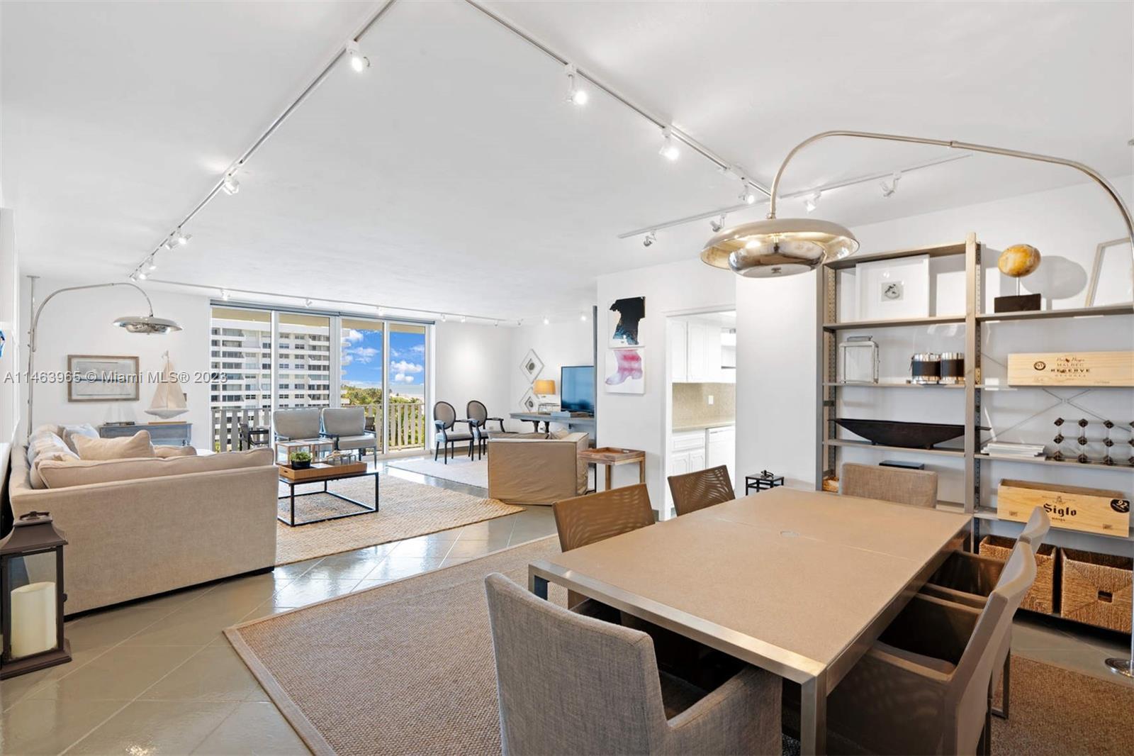 200 Ocean Ln Drive, Unit 703 Key Biscayne, FL 33149 - Photo 4 of 26 a living room with furniture and a table