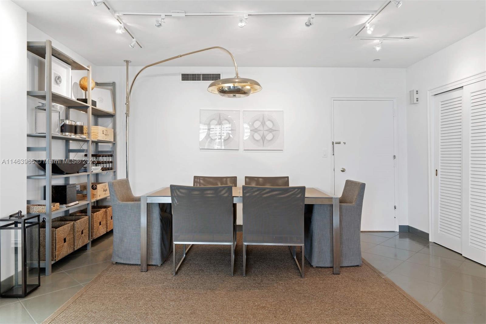 200 Ocean Ln Drive, Unit 703 Key Biscayne, FL 33149 - Photo 6 of 26 a view of a dining room with furniture