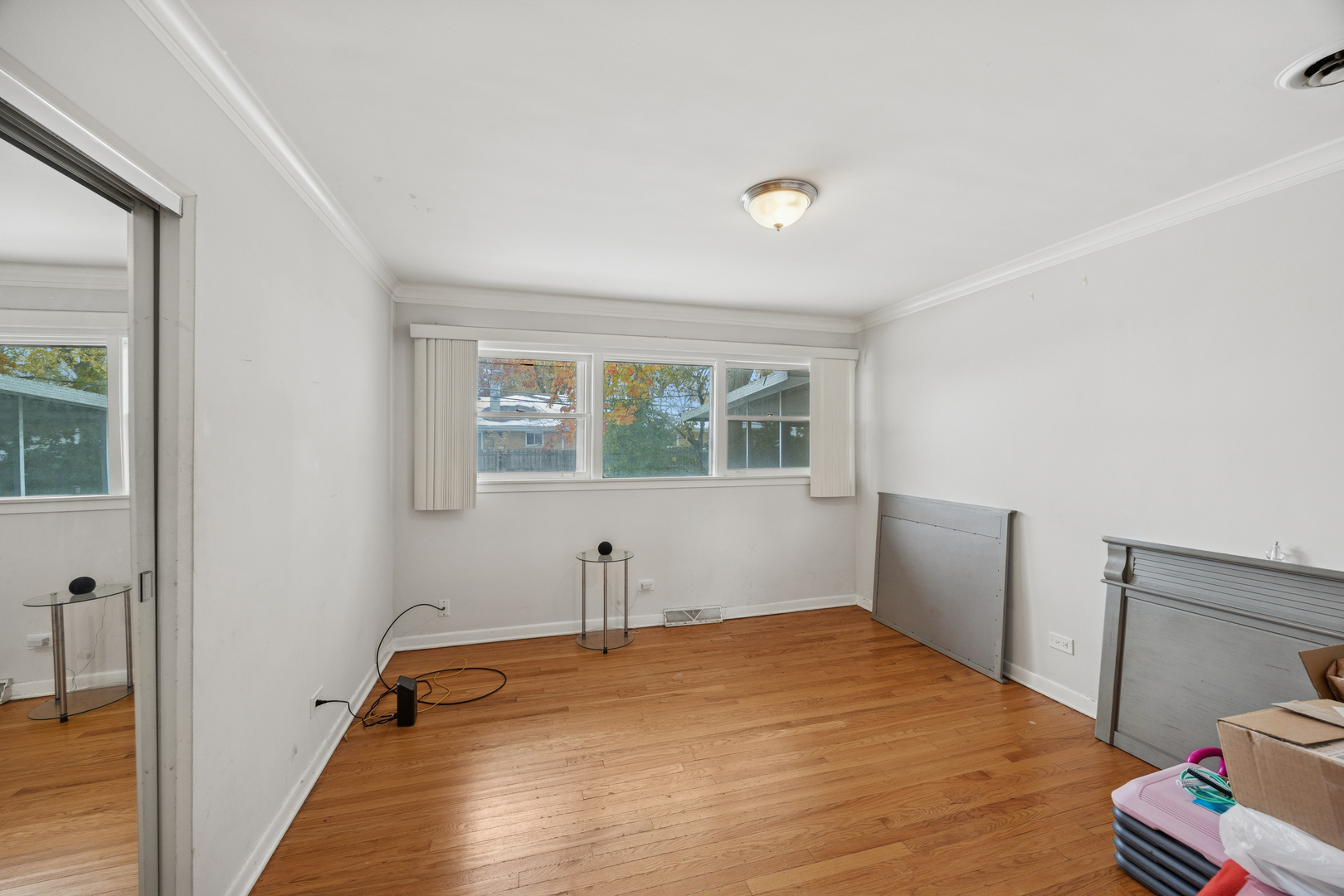 2929 Flossmoor Road Flossmoor, IL 60422 - Photo 10 of 20 a bedroom with a bed and a window