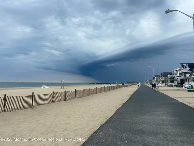 a view of store with outdoor seating