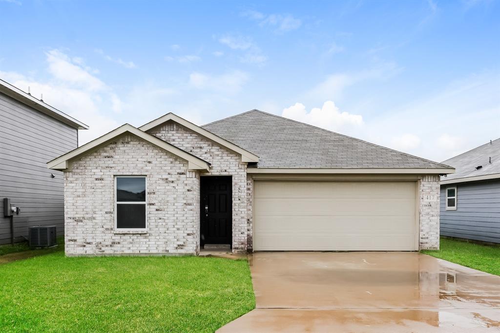 417 Shorty Street Mabank, TX 75147 - Photo 1 of 20 a front view of house with yard