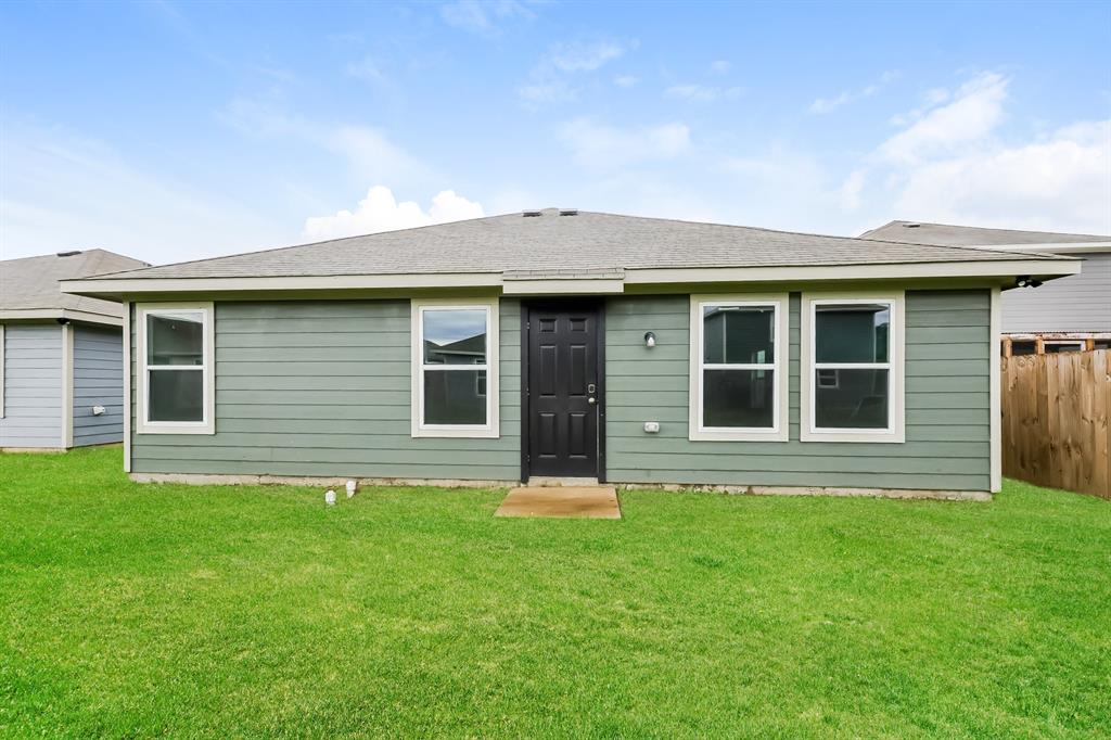 417 Shorty Street Mabank, TX 75147 - Photo 19 of 20 a house that has a garden in front of it