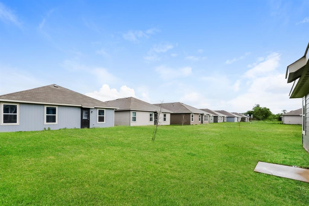 417 Shorty Street Mabank, TX 75147 - Photo 20 of 20 a view of a house with a big yard