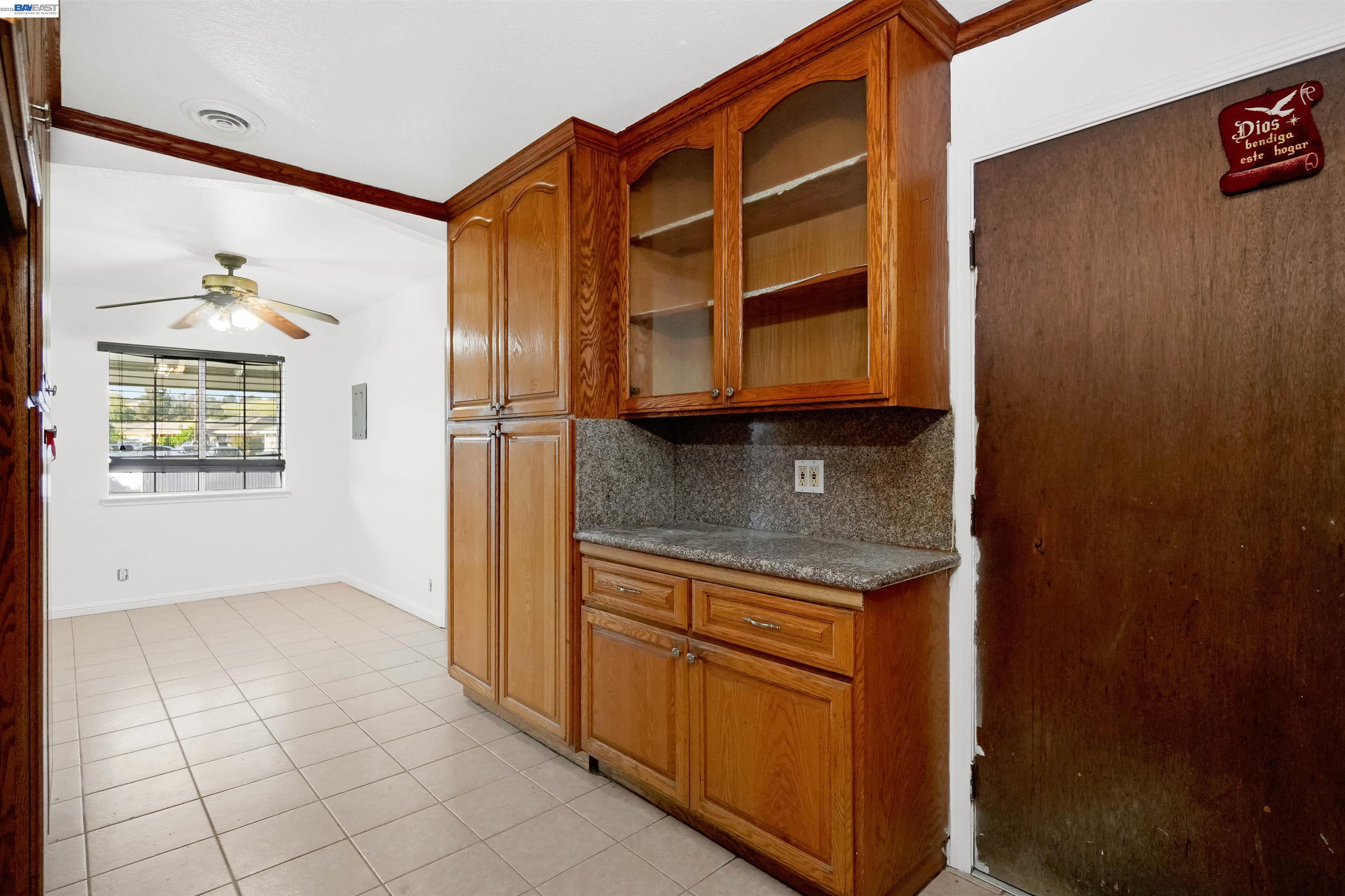 387 Tennyson Road Hayward, CA 94544 - Photo 22 of 48 a kitchen with stainless steel appliances granite countertop a refrigerator and a stove