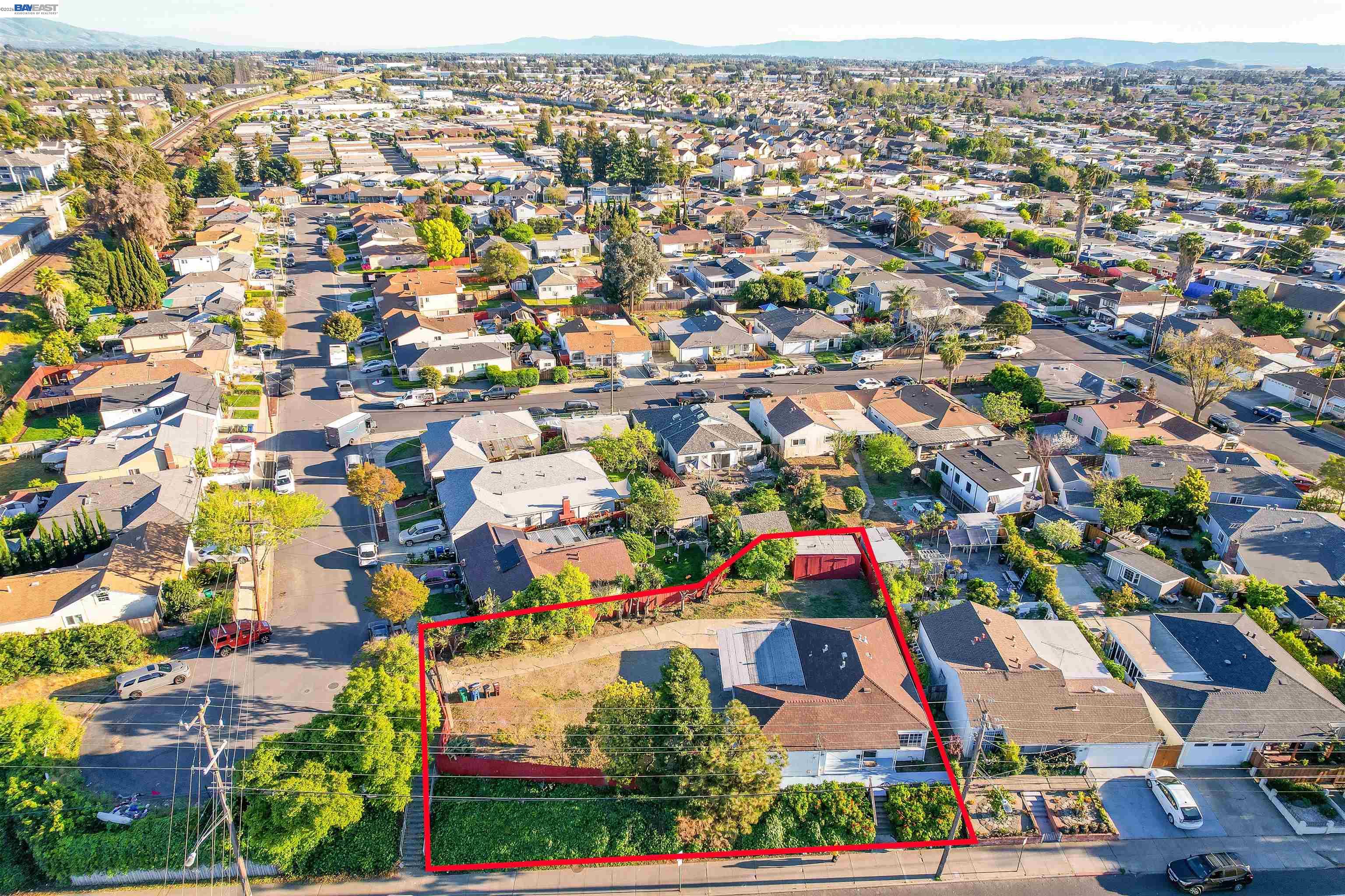 387 Tennyson Road Hayward, CA 94544 - Photo 45 of 48 an aerial view of residential houses with city street