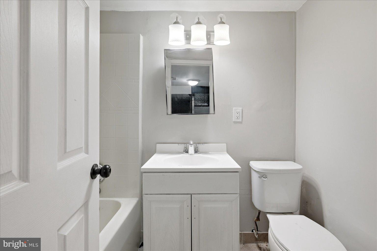 9110 Meadow Heights Road Randallstown, MD 21133 - Photo 33 of 39 Modern bathroom with sleek finishes.