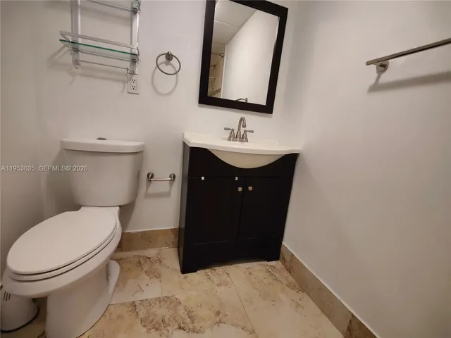 a bathroom with a sink and a toilet