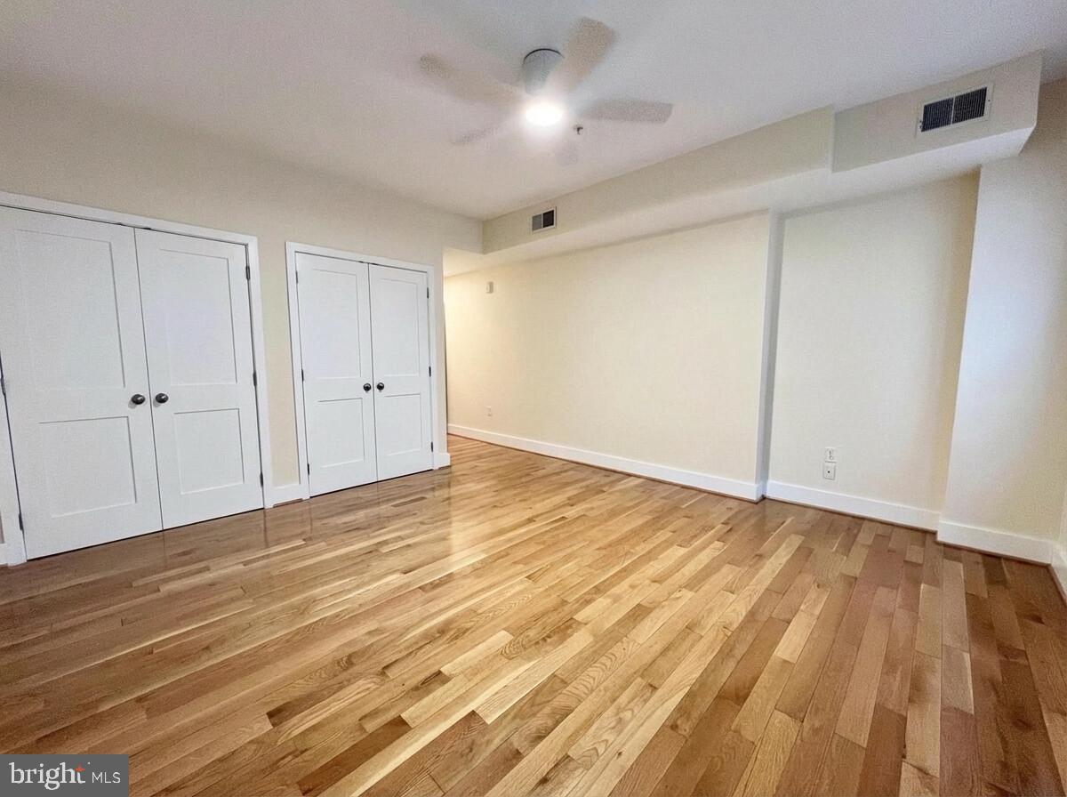 112 Market Street, Unit 4 Philadelphia, PA 19106 - Photo 13 of 15 wooden floor in an empty room