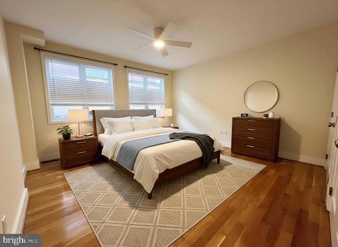 112 Market Street, Unit 4 Philadelphia, PA 19106 - Photo 10 of 15 a bedroom with a bed and a window