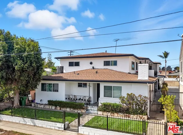 a front view of a house with a porch