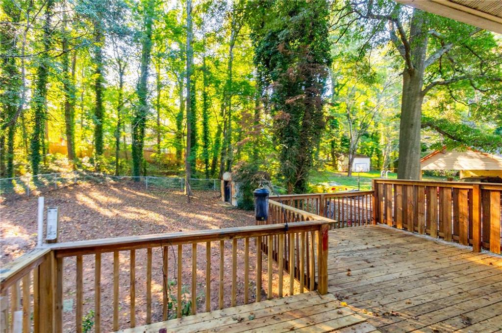 4908 Tarleton Drive Southwest Lilburn, GA 30047 - Photo 23 of 41 a view of a roof deck