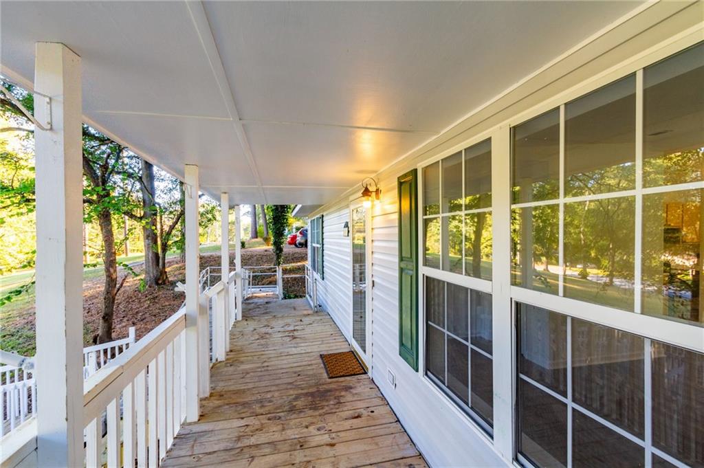 4908 Tarleton Drive Southwest Lilburn, GA 30047 - Photo 32 of 41 a view of a porch