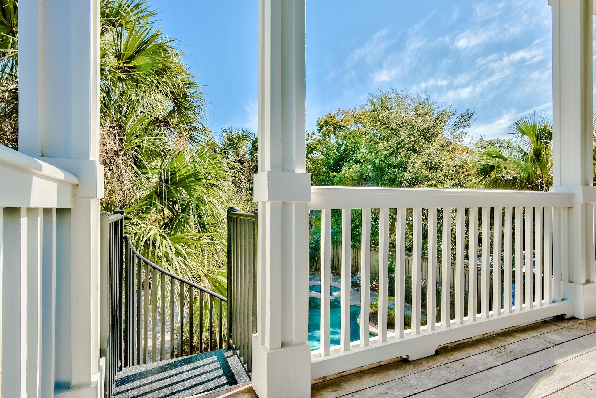 433 Defuniak Street Santa Rosa Beach, FL 32459 - Photo 13 of 57 a view of a balcony with plants