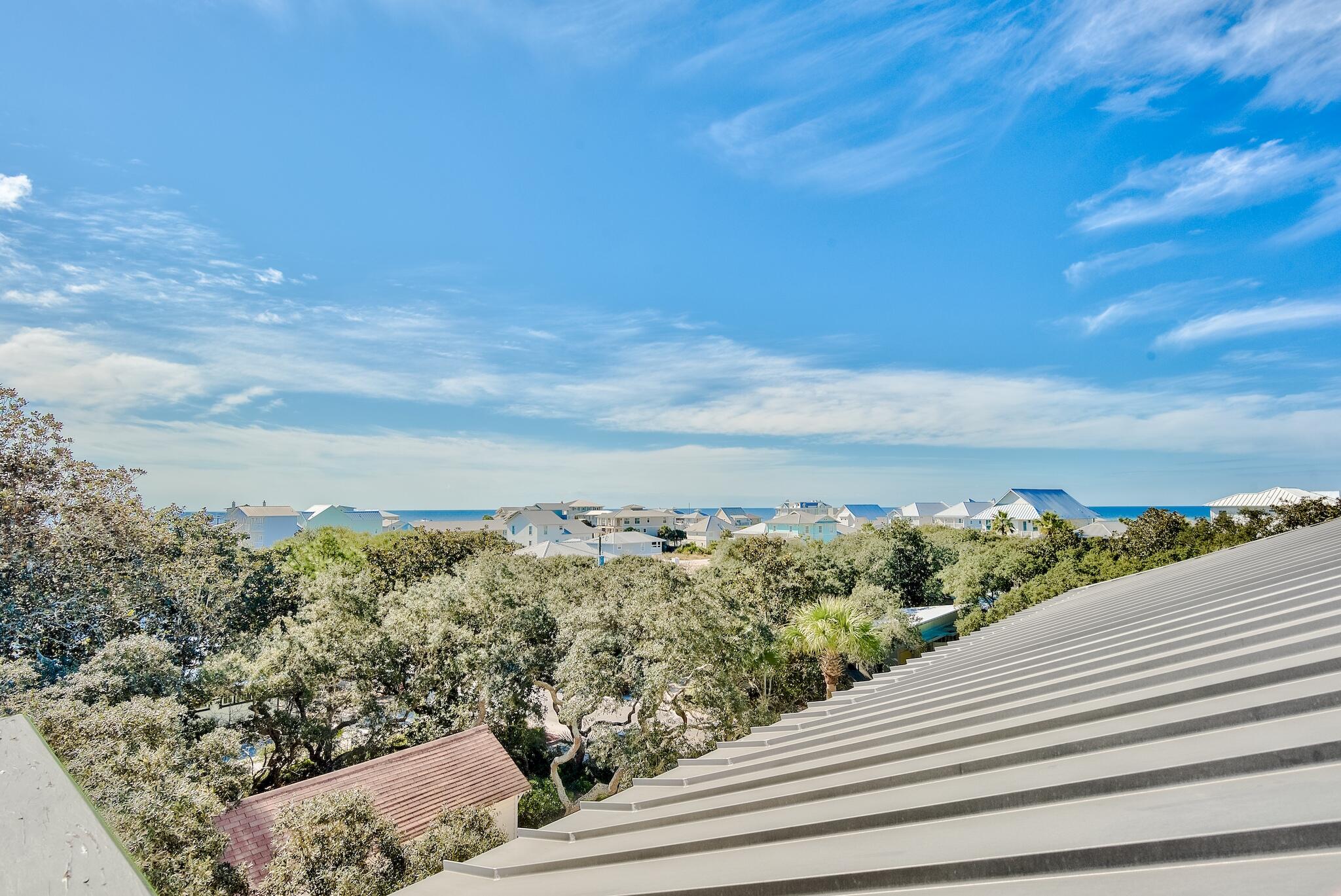 433 Defuniak Street Santa Rosa Beach, FL 32459 - Photo 17 of 57 a view of a city from a terrace
