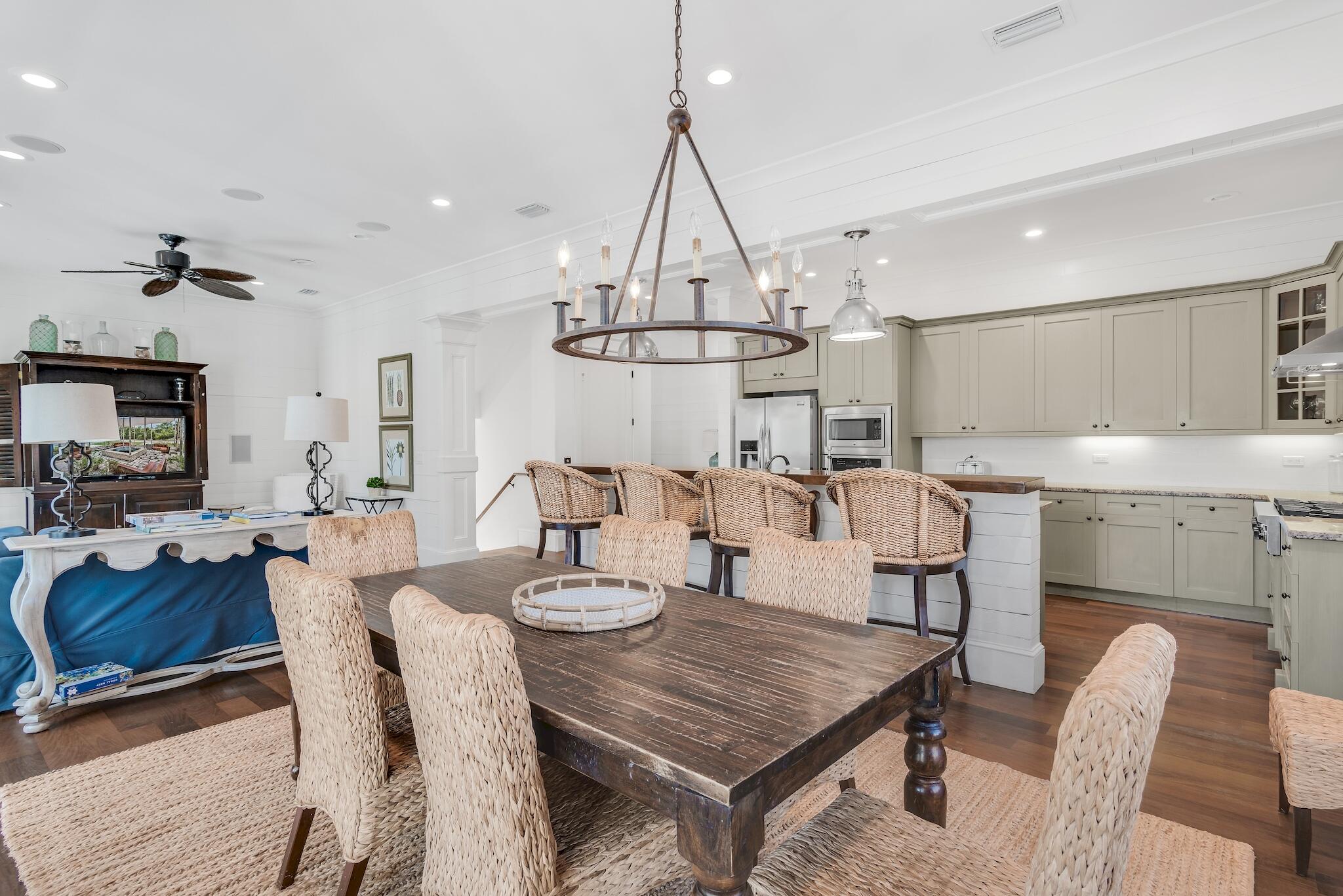 433 Defuniak Street Santa Rosa Beach, FL 32459 - Photo 22 of 57 a view of a dining room with furniture