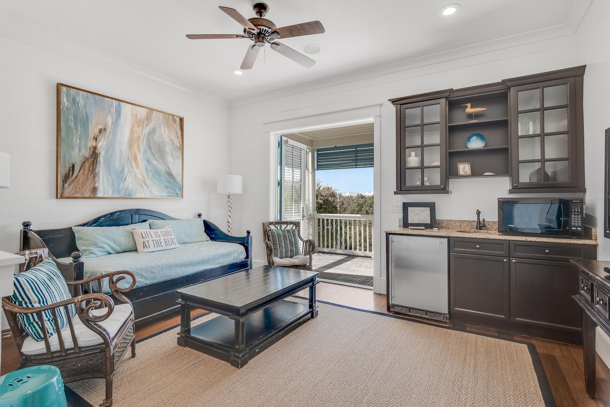 433 Defuniak Street Santa Rosa Beach, FL 32459 - Photo 38 of 57 a living room with furniture and a window