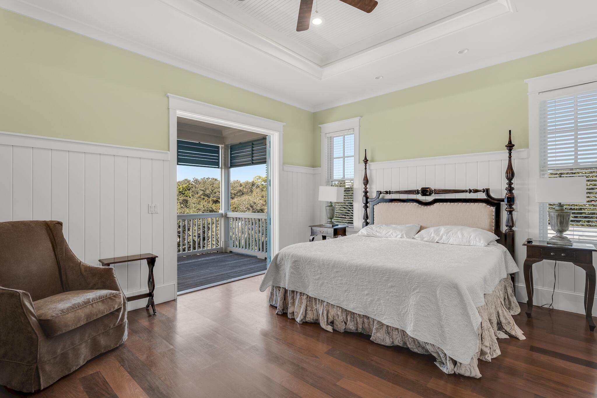 433 Defuniak Street Santa Rosa Beach, FL 32459 - Photo 40 of 57 a bedroom with a bed a couch and a window