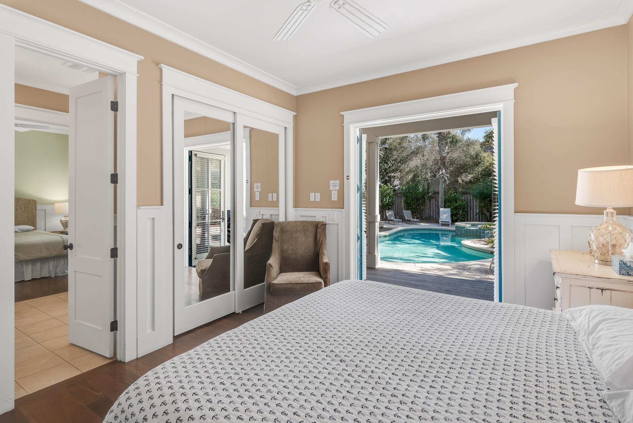 433 Defuniak Street Santa Rosa Beach, FL 32459 - Photo 46 of 57 a bedroom with a bed and a large window