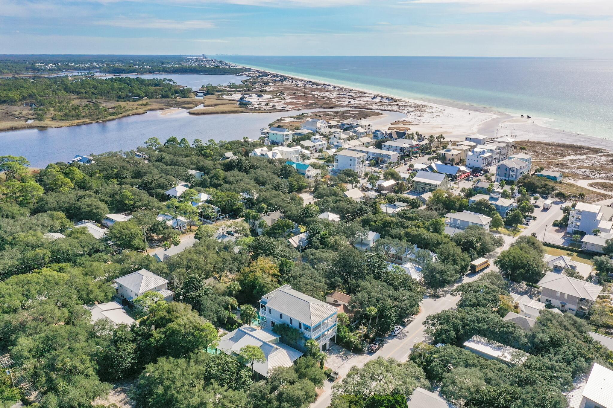 433 Defuniak Street Santa Rosa Beach, FL 32459 - Photo 55 of 57 an aerial view of residential houses with outdoor space and trees