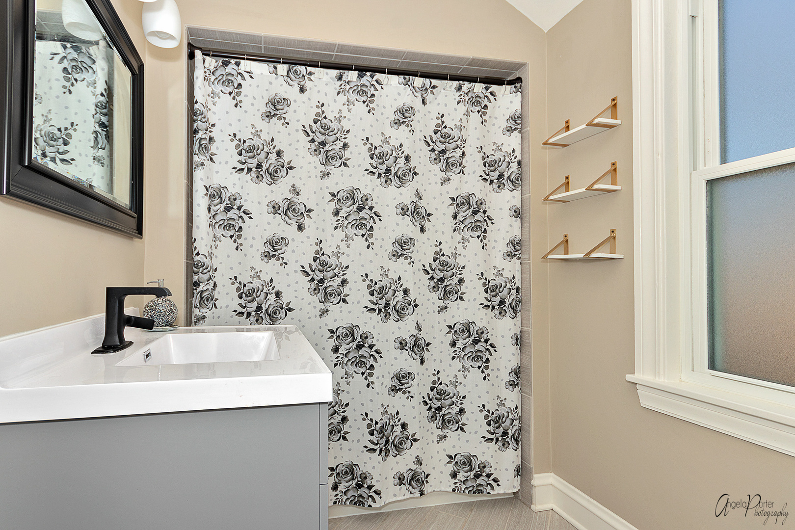 5824 Prospect Avenue Berkeley, IL 60163 - Photo 16 of 26 a bathroom with a sink and a mirror