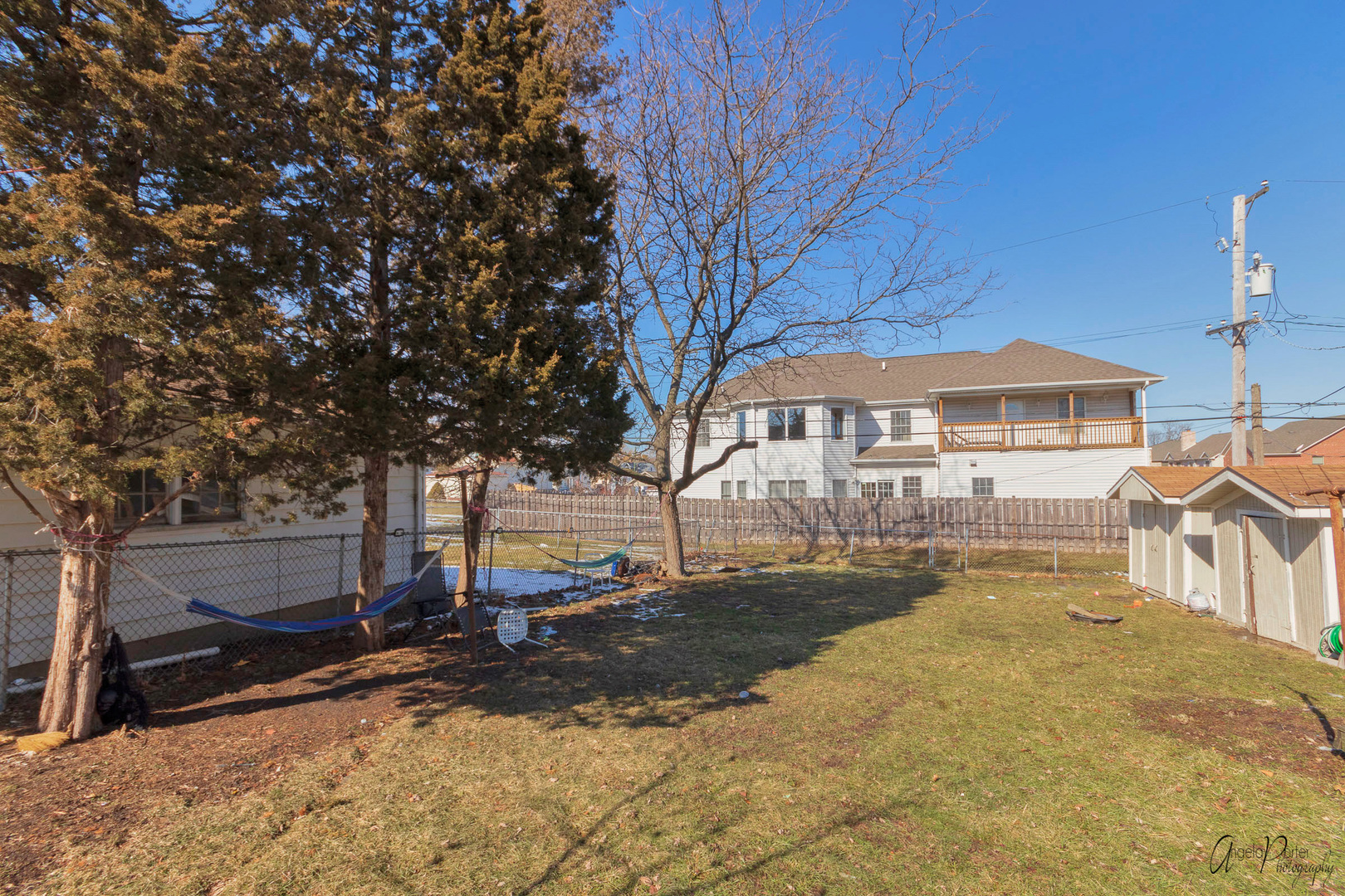 5824 Prospect Avenue Berkeley, IL 60163 - Photo 24 of 26 a view of a house with snow on the side of the road