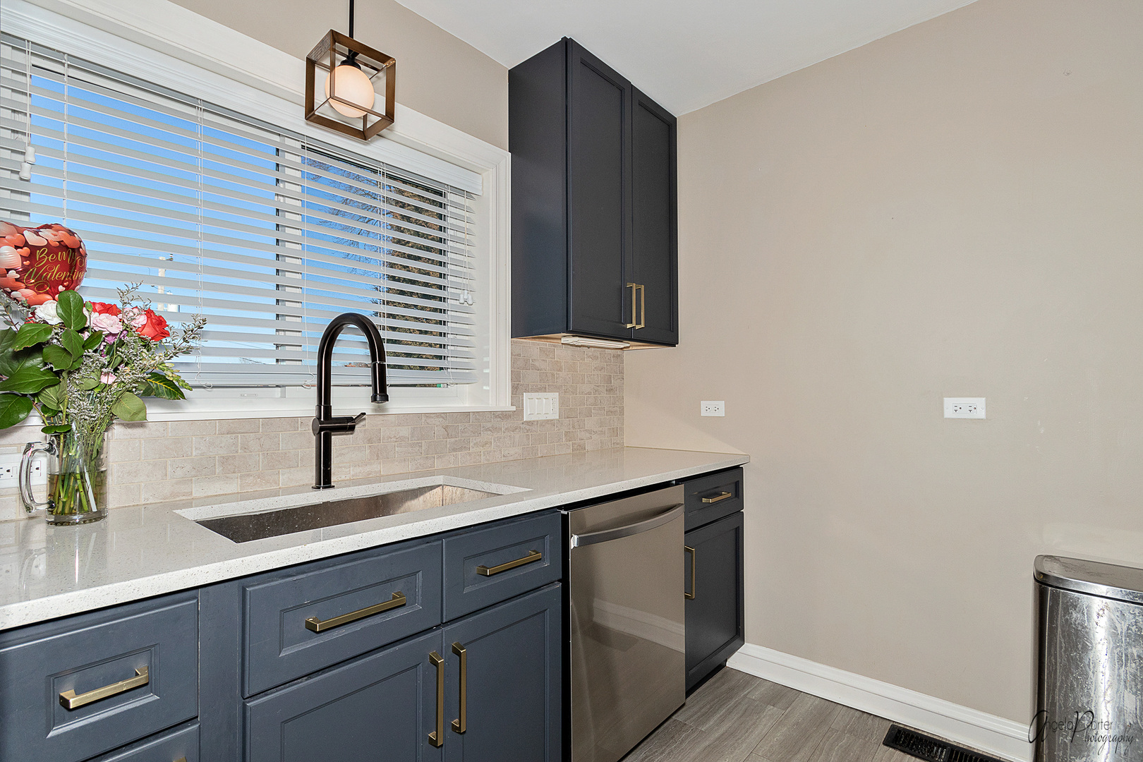 5824 Prospect Avenue Berkeley, IL 60163 - Photo 3 of 26 a kitchen with a sink and cabinets