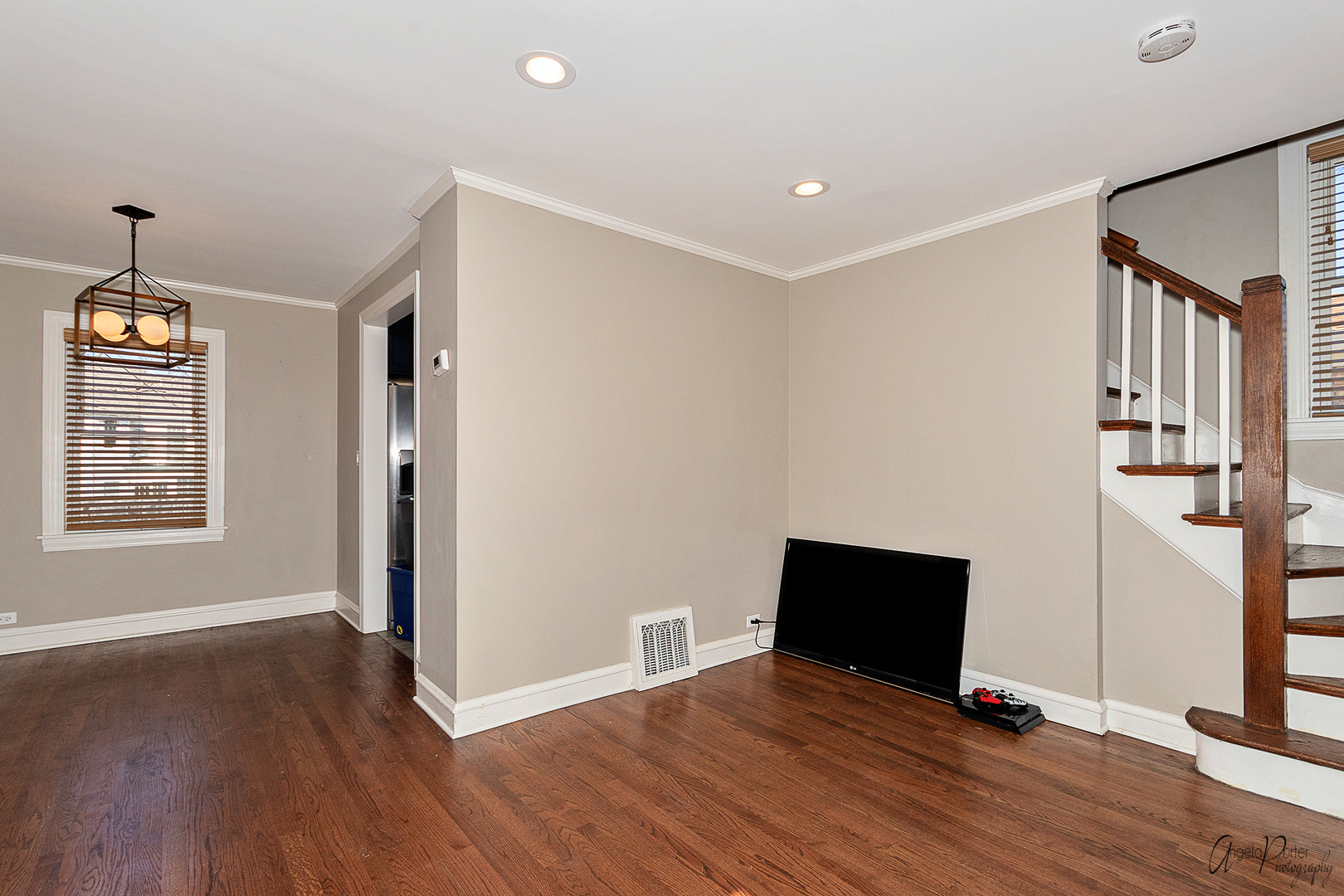 5824 Prospect Avenue Berkeley, IL 60163 - Photo 9 of 26 a view of room with wooden floor and windows