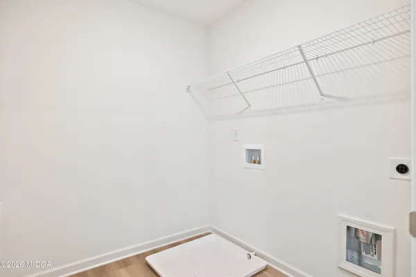 a view of a room with racks on the wall