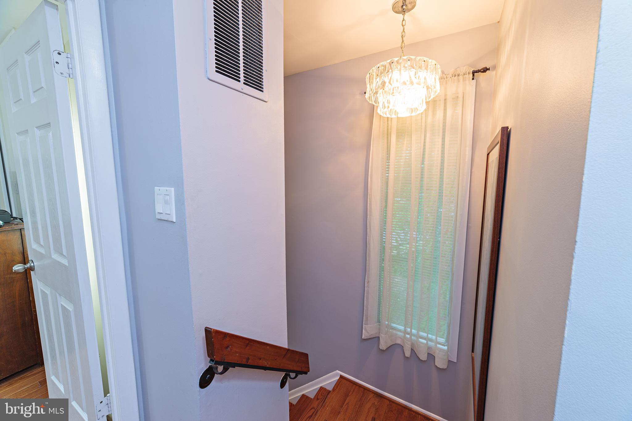 8757 Ridge Hollow Court Springfield, VA 22152 - Photo 31 of 50 Going Down from Upper Level to the Main Level