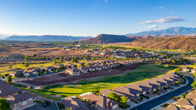 2212 Chippenham Court St. George, UT 84770 - Photo 50 of 75 Aerial view of residential area with mountains and a golf club