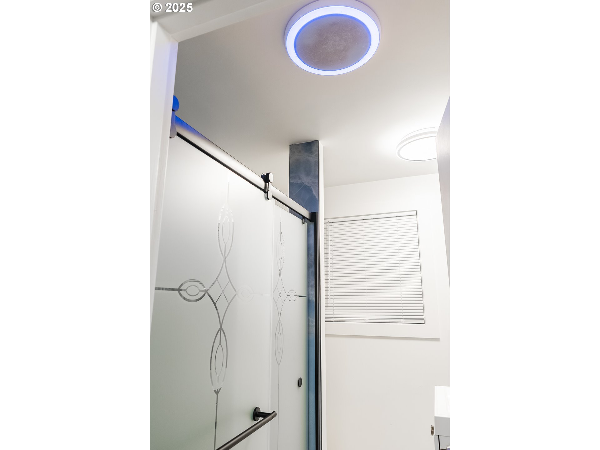 815 North King Street Seaside, OR 97138 - Photo 14 of 33 a bathroom with a granite countertop shower and a sink