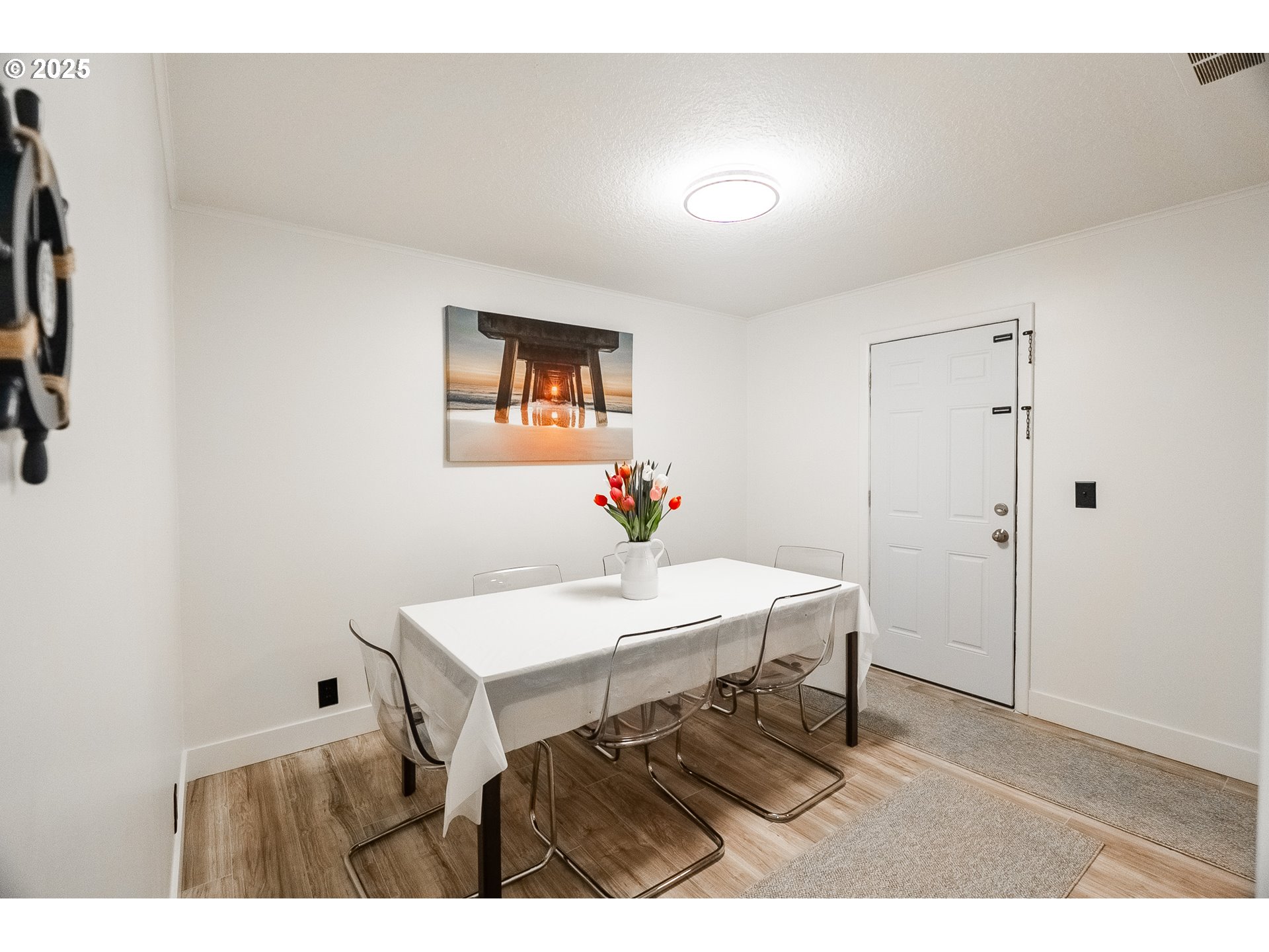 815 North King Street Seaside, OR 97138 - Photo 16 of 33 a dining room with a table and chairs