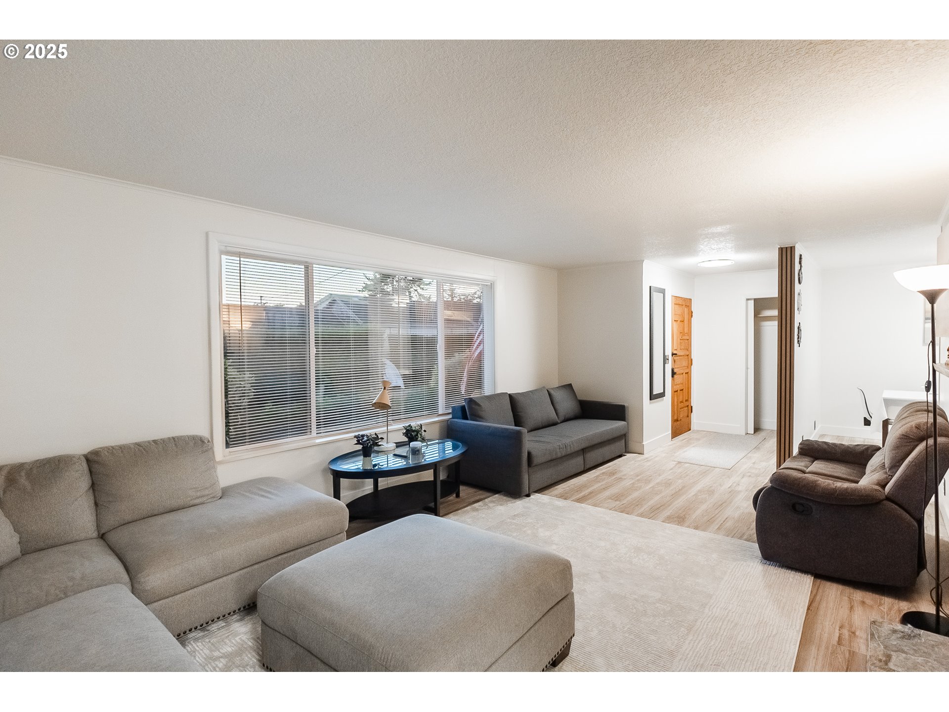 815 North King Street Seaside, OR 97138 - Photo 6 of 33 a living room with furniture and a large window