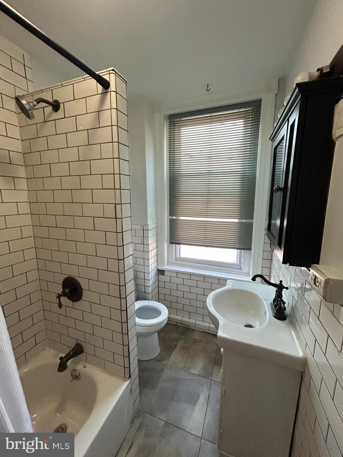 3700 Midvale Avenue, Unit 2 Philadelphia, PA 19129 - Photo 11 of 13 a bathroom with a sink toilet and shower